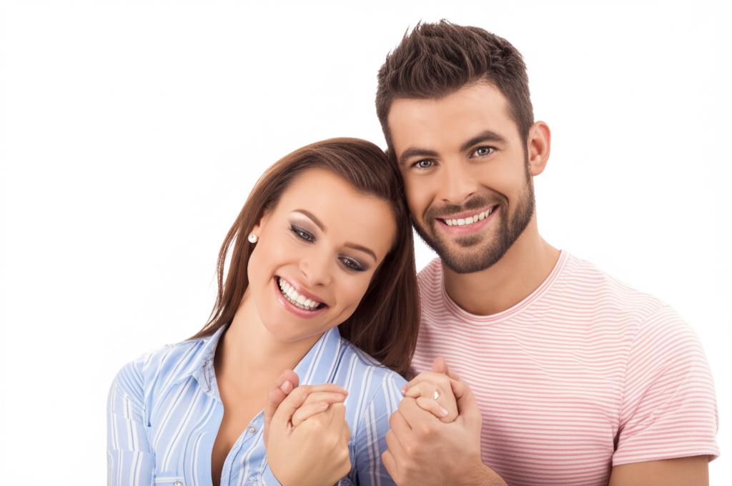 A happy couple smiling and holding hands, symbolizing restored marital intimacy and happiness.