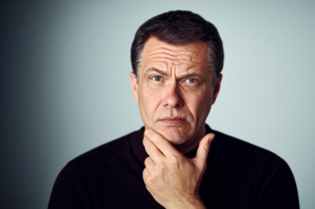 man looking concerned about health